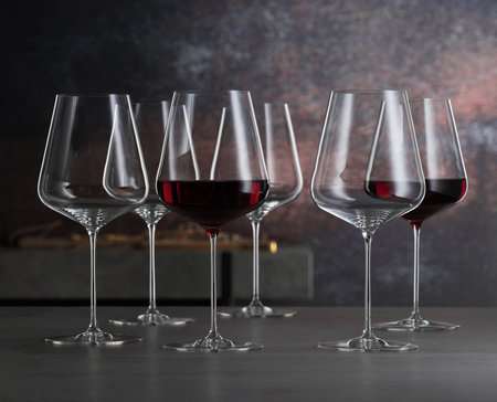 Set of red wine glasses on a bar tableの写真素材