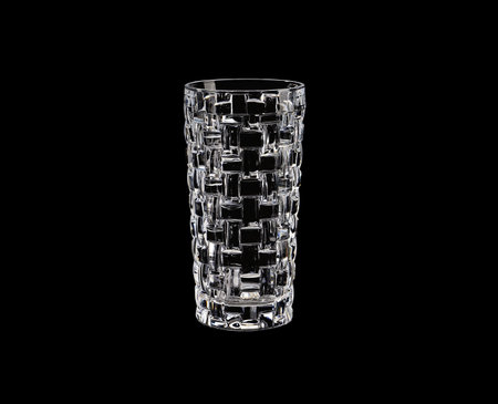 Empty crystal glass isolated on a black backgroundの写真素材
