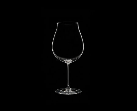Empty glass of wine on stem isolated on black backgroundの写真素材