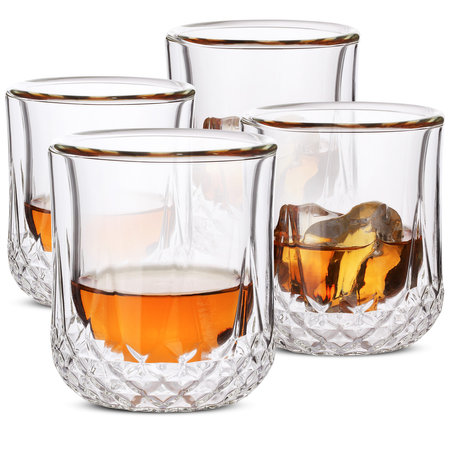 Set of whiskey with ice in double wall glassの写真素材