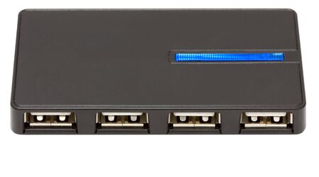 Black usb a hub on four ports with a blue light-emitting diodeの写真素材