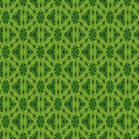 Green decorative tile with fine rhomboid patterns composed of small green hairy spheresの写真素材