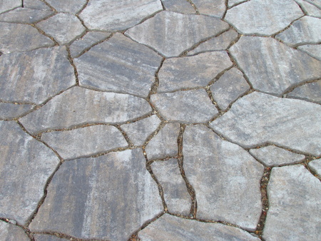 Texture gray natural stone garden pavement, decorative mosaicの写真素材
