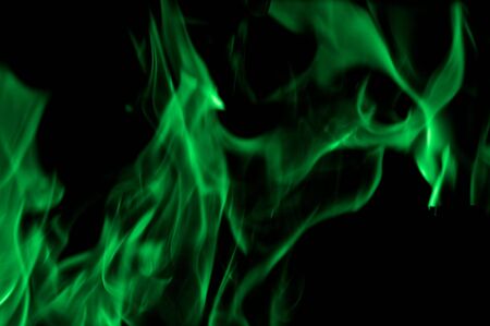 Green abstract swirls on blackの写真素材