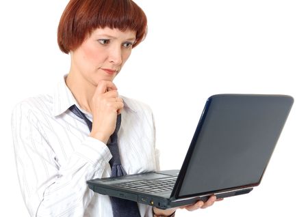 Beautiful smiling secretary with the laptop.の写真素材