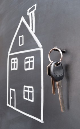 sketch of house on the blackboard and the keysの写真素材