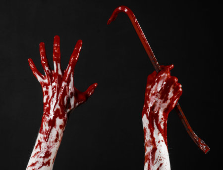 Bloody hands with a crowbar, hand hook, halloween theme, killer zombies, black background, isolated,...