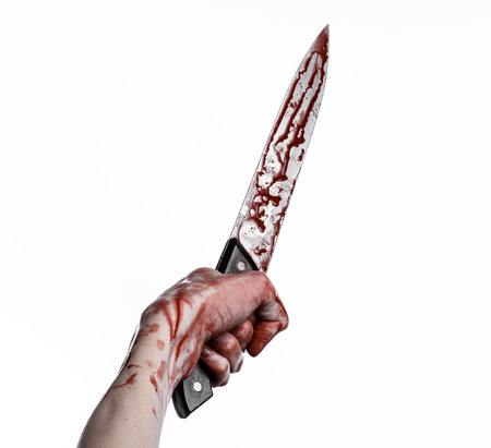 bloody hand holding a knife, a large bloody knife, bloody theme, a killer with a knife, halloween theme, white background, isolated, violence, suicide, murder, a thug, a butcher studioの写真素材