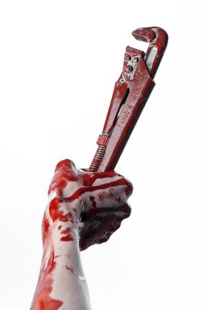 Halloween theme with hand and wrench with blood stainの写真素材