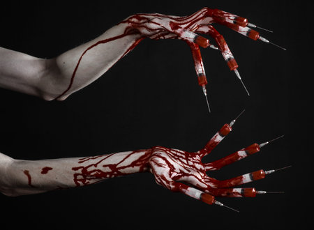 Bloody hand with syringe on the fingers, toes syringes, hand syringes, horrible bloody hand,...