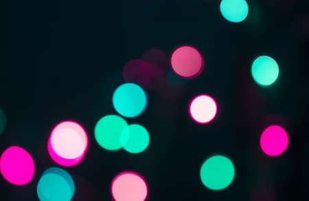 Abstract blurred background and theme: colorful bokeh blurred lights on a darkの写真素材