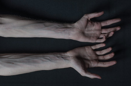 Gothic horrible Halloween theme: thin hands of death studio