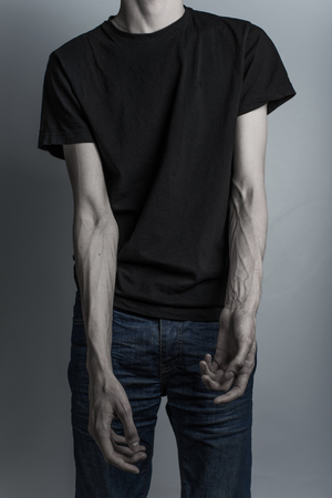 thin hands of a drug addict in studioの写真素材