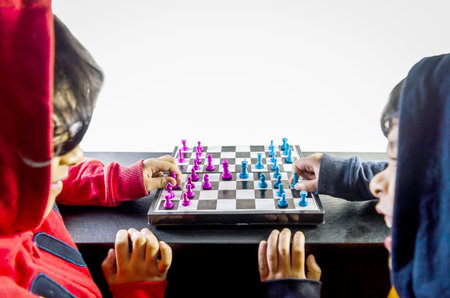 Kids playing chessboard top view isolated in white background