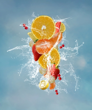 Fruits and water splashesの写真素材