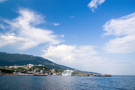 landscape with seaport, ships, blue sea and skyの写真素材