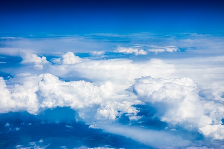 blue sky and clouds from airplane windowの写真素材
