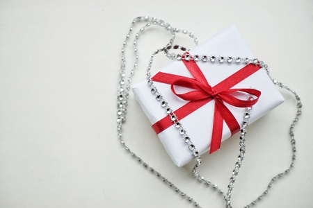 Gift box on the white background. Red ribbon. Valentine's Day gift.の写真素材
