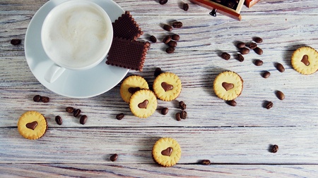 cookies in the shape of hearts, on the cookie letters LOVE. the concept of a gift for Valentines day on February 14. selective focusの写真素材