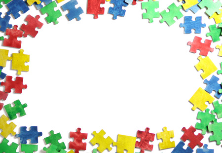 Colourful jigsaw puzzle and alphabet tiles with AUTISM word. Autism conceptの写真素材