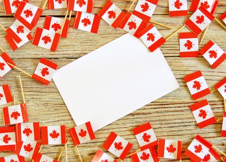 National day of Canada concept with flag on white wooden background top viewの写真素材