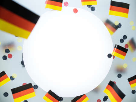 German Unity Day. October 3. National flags on a foggy background. The concept of patriotism, memory, and freedomの写真素材