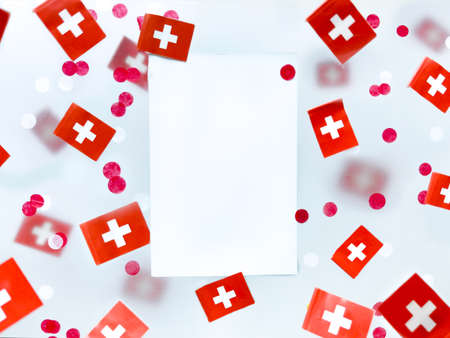 Switzerland, August 1, day foundation confederation. National holiday. the concept of memory, patriotism and freedom. Flags on a foggy background. Mockup.の写真素材