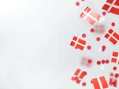 Denmark. June 5, constitution day, September 21, happy independence day, national holiday, flag foggy background. Dannebrog. Defocusingの写真素材