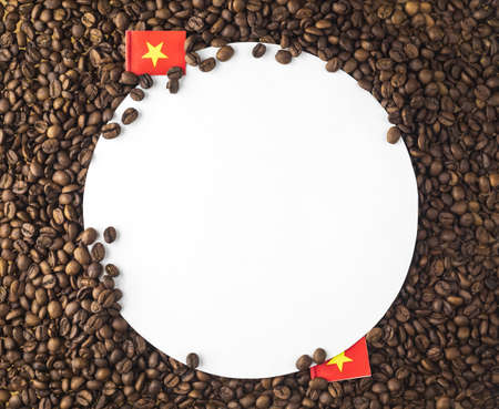Robusta coffee with a mini flag of the country Vietnam. The concept of patriotism and pride. high quality photoの写真素材