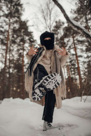 girl having fun in the winter forestの写真素材