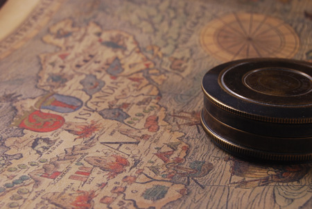 vintage shabby compass and old mapの写真素材