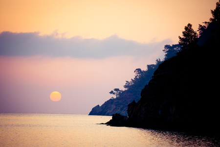 Sunrise silhouette above sea and sky Turkeyの写真素材