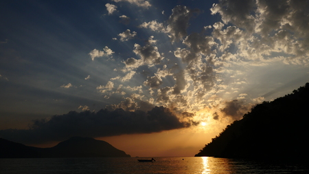 Sunrise silhouette above sea and sky Turkeyの写真素材