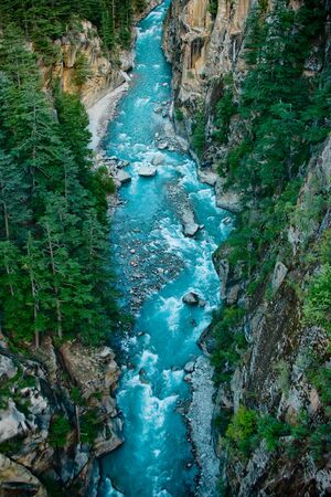 River Ganga in valley Himalayas mountainsの写真素材