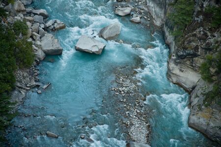 River Ganga in valley Himalayas mountainsの写真素材