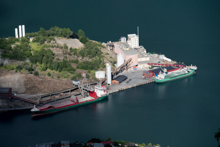 Ship Boat parom on the fjords of Norway, mountain in the background