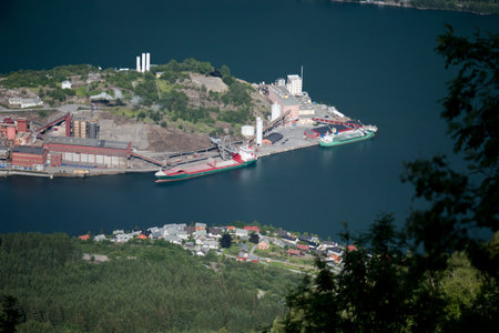 Ship Boat parom on the fjords of Norway, mountain in the background