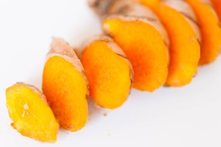Turmeric roots isolated on white backgroundの写真素材