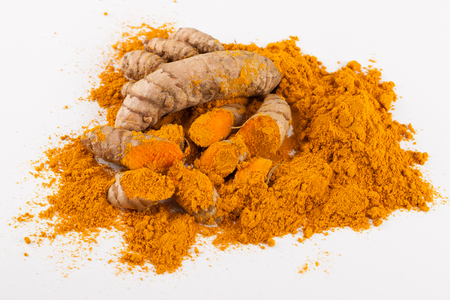 Turmeric roots with turmeric powder. Spice symbol. For food design, restaurant, store, market, health care products. Can be used as logo, price tag, labelの写真素材