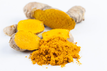 Turmeric roots with turmeric powder. Spice symbol. For food design, restaurant, store, market, health care products. Can be used as logo, price tag, labelの写真素材