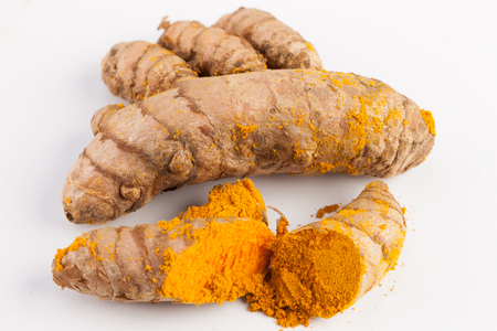 Turmeric roots with turmeric powder. Spice symbol. For food design, restaurant, store, market, health care products. Can be used as logo, price tag, labelの写真素材