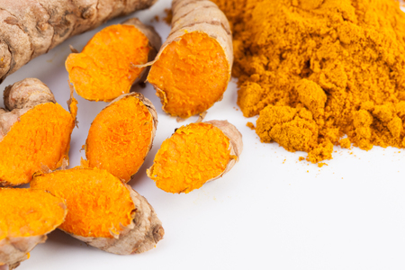 Turmeric roots isolated on white backgroundの写真素材