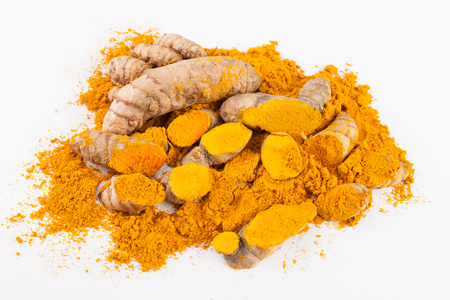 Turmeric roots isolated on white backgroundの写真素材