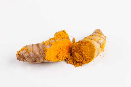 Turmeric roots isolated on white backgroundの写真素材