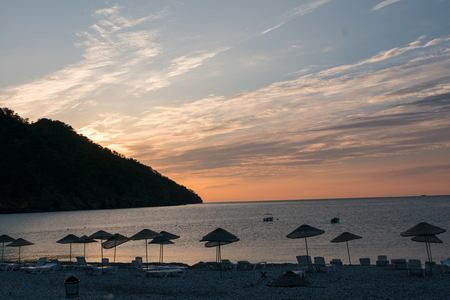 Sunrise silhouette on the beach Turkeyの写真素材
