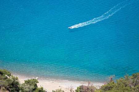 Boat in blue sea laguna background Turkeyの写真素材