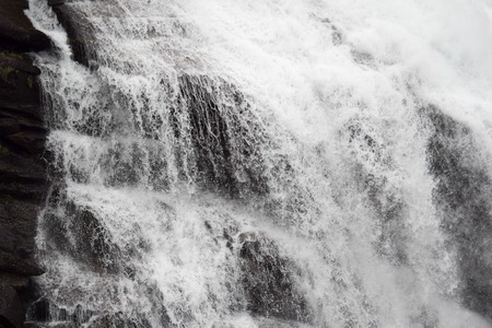 Very beautiful powerful waterfall in Norway with the effect of flowing waterの写真素材