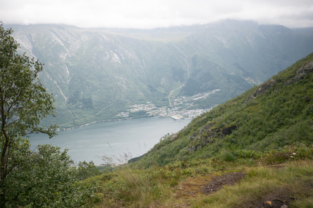 Fjord reflection in clear water in Norwayの写真素材