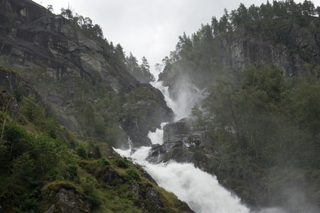 Very beautiful powerful waterfall in Norway with the effect of flowing waterの写真素材