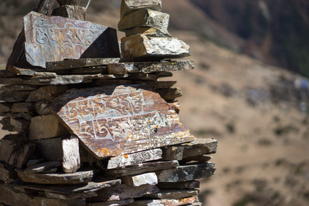 Stone with tibetian mantras Tibet sanscritの写真素材